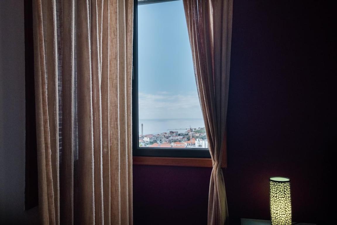 شقة Guestready - Serene Escape In Câmara de Lobos المظهر الخارجي الصورة